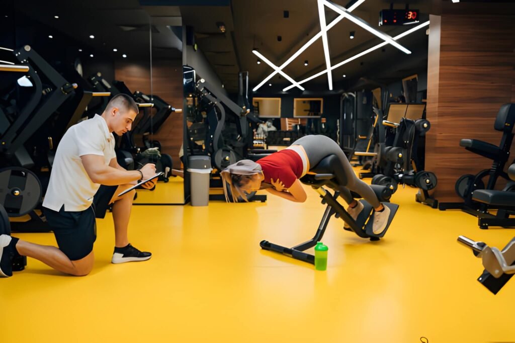 ertificated personal gym instructor, planning new exercises for next week in his chart